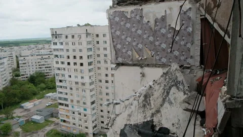 Survived carpet on the wall. Destroyed residential building. Kharkiv, Ukraine Stock Footage 197607553