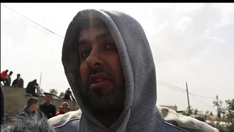 Survivors describe the Iranian attack in Beit Awwa that left four dead, Beit Awa Stock Footage 331097953