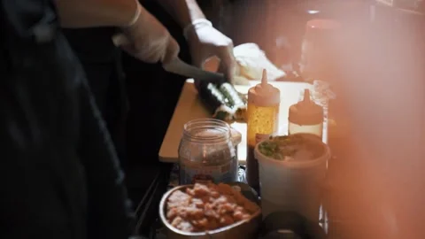 Sushi being cut with knife at event Stock Footage 138035521