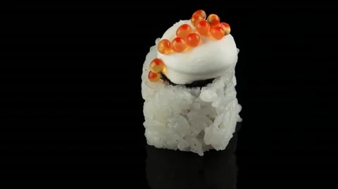Sushi with caviar on black background rotating Stock Footage 55638018