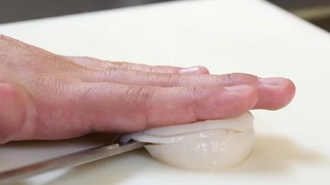 Sushi Chef Cutting a Scallop Sashimi Style 스톡 동영상 80557158