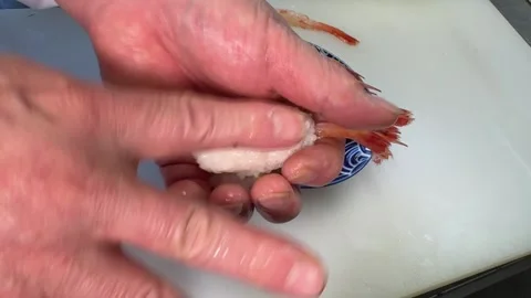 Sushi: Chef Hands Making Sweet Shrimp Nigiri, Overhead View On A White Board Stock Footage 348279458