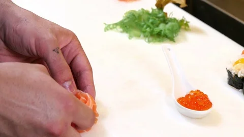 Sushi Chef Preparing Salmon and Roes Sashimi Flower Stock Footage 80557696