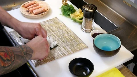 Sushi Chef Preparing Salmon Uramaki Roll Stock Footage 80557422