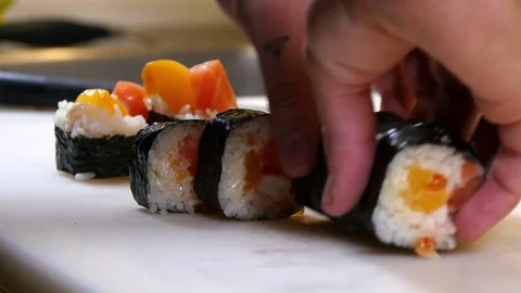 Sushi Chef Presenting Salmon Peach Futomaki Roll Video stock 80557591