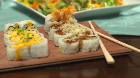 Sushi Close Up Move Right  and Left on a Table Spread Stock Footage 64974211