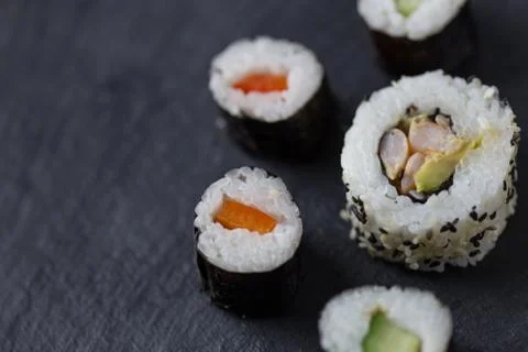 Sushi closeup on dark background Stock Photos