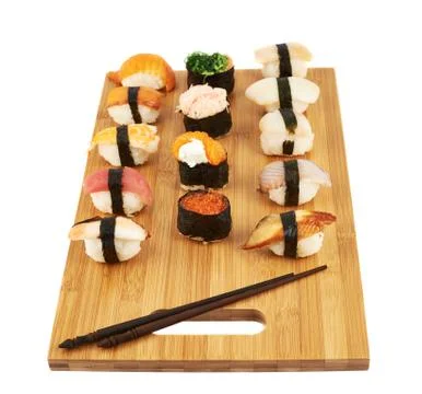Sushi composition over cutting board Stock Photos