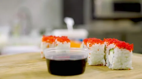 Sushi covered with red eggs Stock Footage 150622402