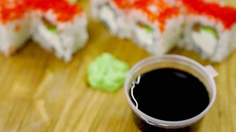 Sushi covered with red eggs Stock Footage 150683325