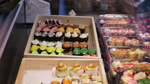 Sushi of different flavors are placed together Stock Footage 322779114