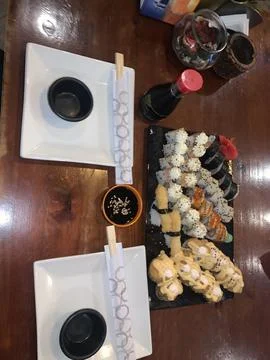Sushi Dining Setup for Two with Soy Sauce Stock Photos