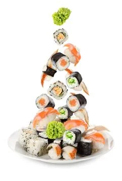 Sushi falling in the plate Stock Photos