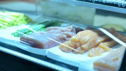 Sushi ingredients on serving bar. soft focus. Stock Footage 93562799