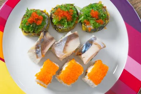 Sushi mixed set with different fish, seaweed and caviar. Restaurant home food Stock Photos