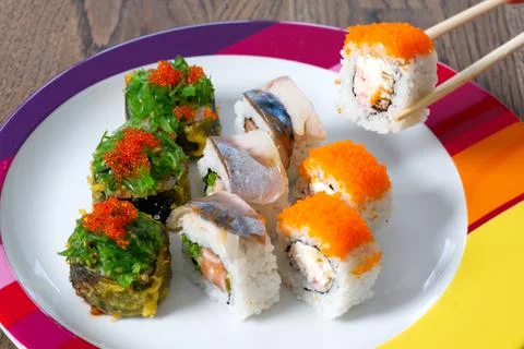 Sushi mixed set with different fish, seaweed and caviar. Restaurant home food Stock Photos