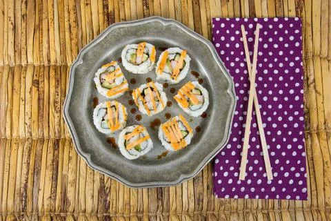 Sushi pinwheels on pewter plate Stock Photos