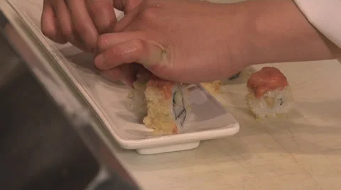 Sushi placing on plate Stock Footage 24234148