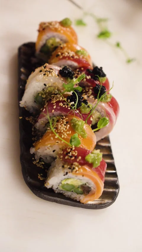 Sushi on plate in restaurant Stock Footage 294080314