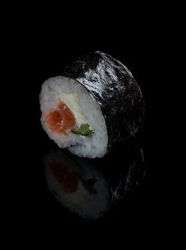 Sushi roll on the black table Stock Photos