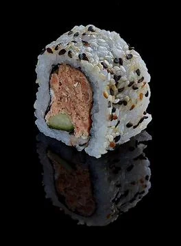 Sushi roll on the black table Stock Photos