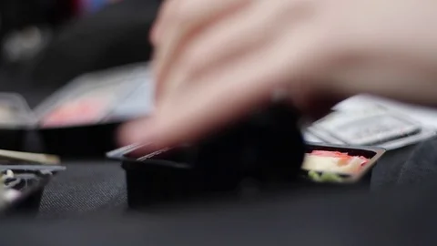 Sushi roll close-up in a box, slow mo wasabi and soy sauce, delicious food deliv Stock Footage 127519942