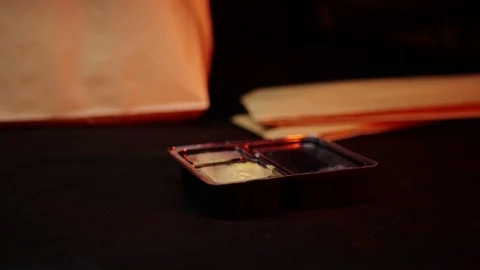 Sushi roll close-up in a box, slow mo wasabi and soy sauce, delicious food deliv Stock Footage 127521327