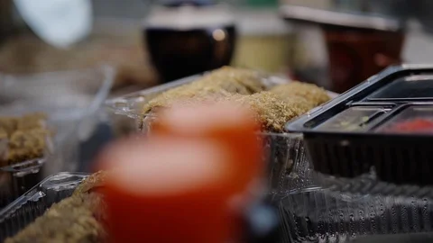 Sushi roll close-up in a box, slow mo wasabi and soy sauce, delicious food deliv Stock Footage 127541645