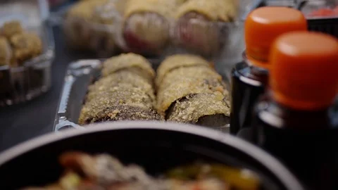 Sushi roll close-up in a box, slow mo wasabi and soy sauce, delicious food deliv Stock Footage 127541650