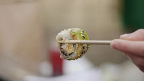 Sushi roll close-up in a box, slow mo wasabi and soy sauce, delicious food deliv Stock Footage 127541830