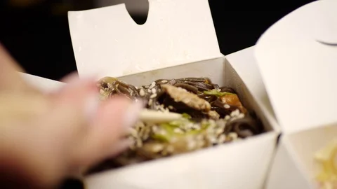 Sushi roll close-up in a box, slow mo wasabi and soy sauce, delicious food deliv Video stock 127541923