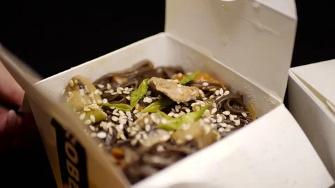 Sushi roll close-up in a box, slow mo wasabi and soy sauce, delicious food deliv Stock Footage 127541928