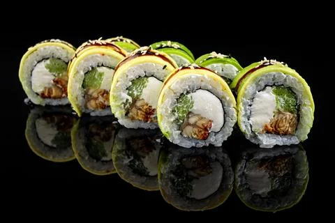 Sushi roll with eel, cucumber, avocado and cream cheese Stock Photos
