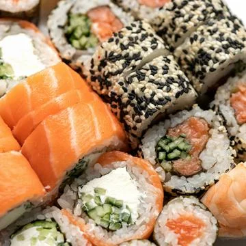 Sushi roll. Inside-out mixed Sushi Set. Close up shot. Traditional Japanese food Stock Photos