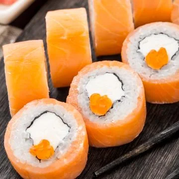 Sushi roll philadelphia with caviar Stock Photos