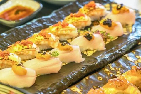 Sushi roll with salmon and shrimp tempura Stock Photos