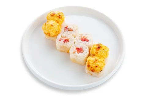 Sushi roll with scrambled eggs, fresh tomato and cream cheese. Baked with che Stock Photos