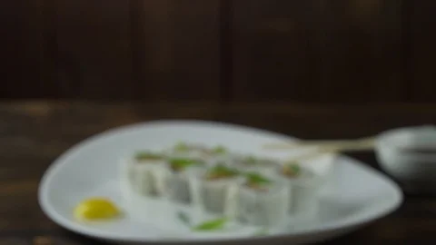 Sushi roll set on the table. Various Japanese dishes are served at the Stock Footage 122077913