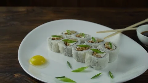Sushi roll set on the table. Various Japanese dishes are served at the Stock Footage 122077942