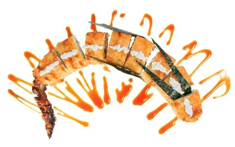 Sushi roll in the shape of a dragon. Stock Photos