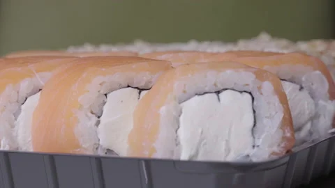 Sushi Roll Turned on a Green Background. Stock Footage 170671040