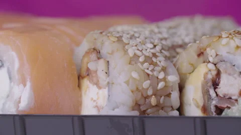 Sushi Roll Turned on a Pink Background Stock Footage 170670874