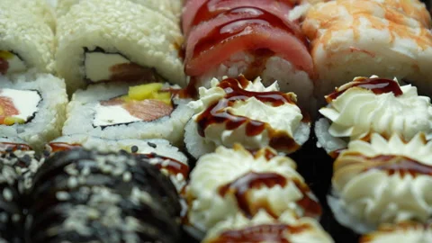 Sushi rolls of different shapes and types Stock Footage 305751872