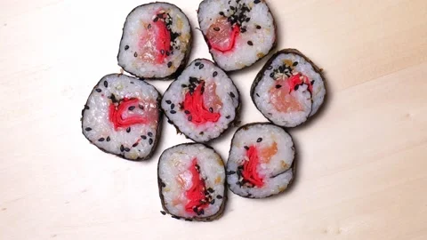 Sushi rolls dyeing close-up slow mo Stock Footage 166967530