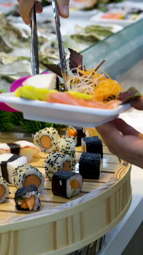 Sushi rolls in a plastic box rotate close-up on black background. Ready-to-eat Stock Footage 277302589