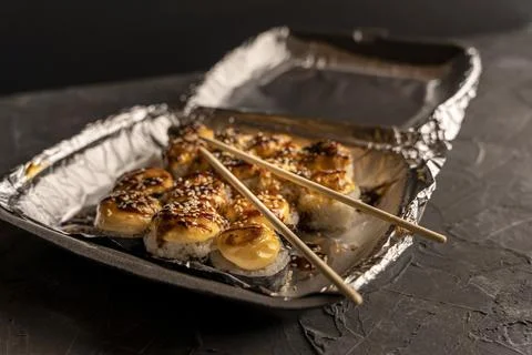 Sushi rolls in a plastic thermo container. Takeaway food Stock-Fotos