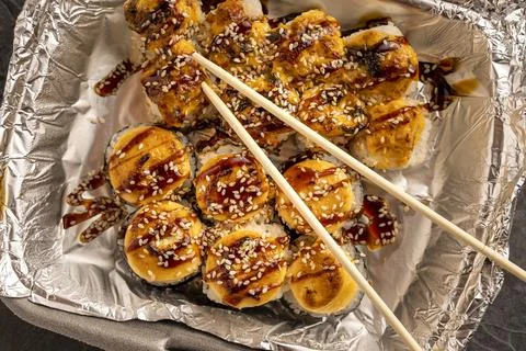 Sushi rolls in a plastic thermo container. Takeaway food Stock-Fotos