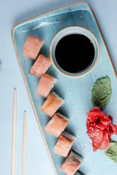 Sushi rolls with salmon in classical set Stock Photos