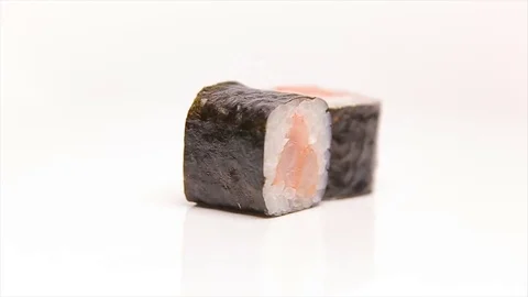 Sushi rolls with shrimps rotating isolated on white Video stock 80565590