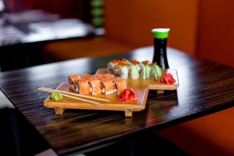 Sushi rolls at the table. Stock Photos